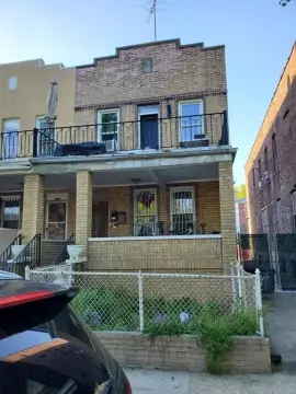 Semi-Attached Two-Family Brick Home