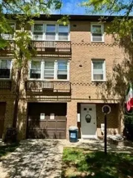 Semi-Detached Three-Family Brick Home