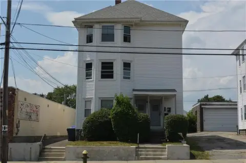 Triplex with Detached Garages