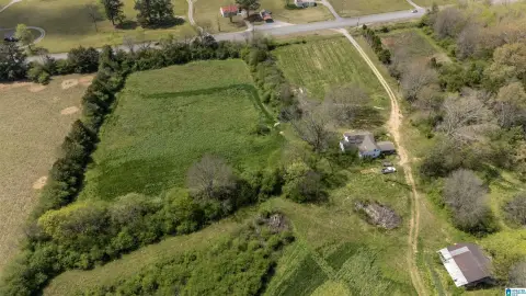 Fenced Agricultural Land with Barn