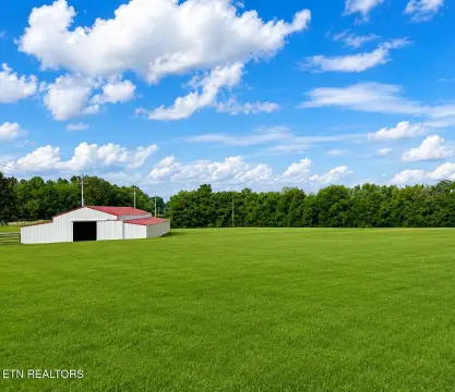 Equestrian Land with Horse Barn