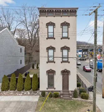 Renovated Triplex with Development Potential