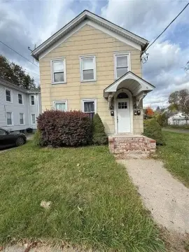 Three-Unit Triplex with Private Driveway