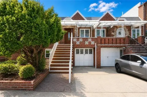 Brick Single-Family Home with Driveway