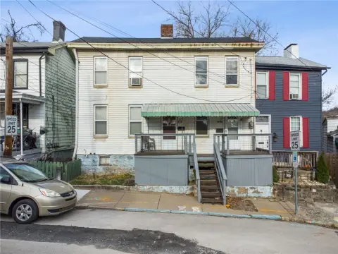 Side-by-Side Duplex with Renovated Unit