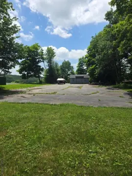 Commercial Land with Storage Shed