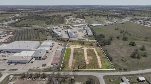 Unrestricted Fenced Commercial Land