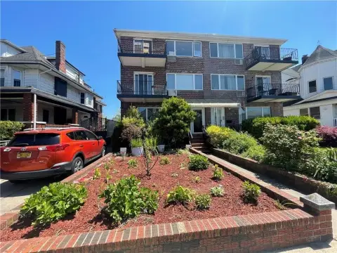 Solid-Brick Three-Family Residence