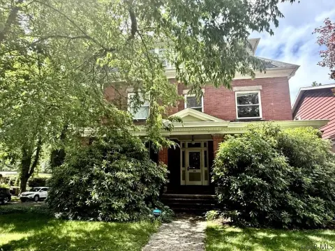 Brick Three-Unit Residential Property