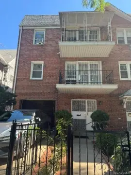 Brick Duplex with Balconies