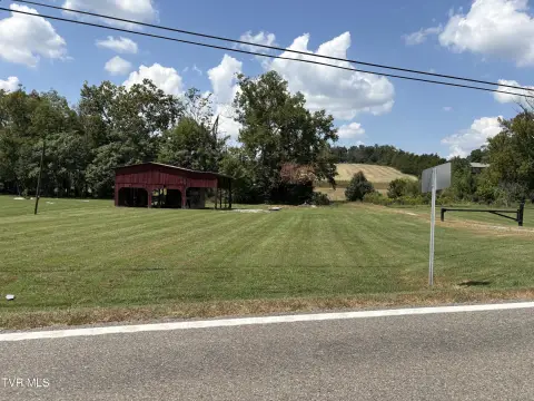 Fenced Agricultural Land with Barn