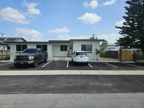 Turnkey Renovated Triplex with Coin Laundry