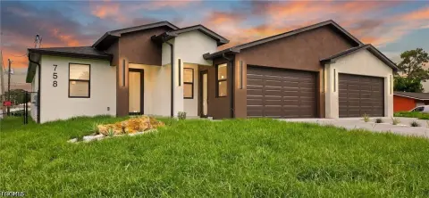 Under-Construction Duplex with Garages