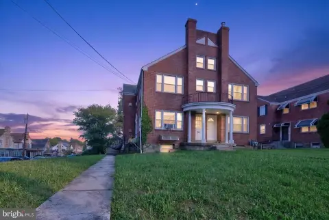 Three-Unit Brick and Stone Triplex