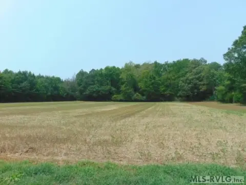 Open and Wooded Farmland Parcel