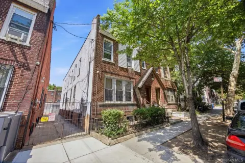 Vacant Brick Triplex with Garage