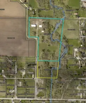 Commercial Land with Machine Sheds