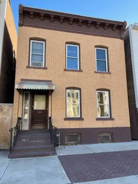 Updated Brick Two-Family Duplex