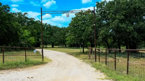 Fenced Ranch with Three Ponds