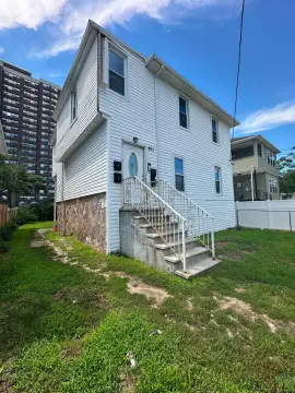 Four-Unit Multifamily Property with Yard