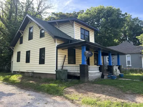 Renovation-Ready Duplex with Income
