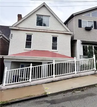 Duplex with Off-Street Parking Pad