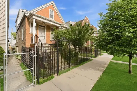 Brick Triplex with 3-Car Garage