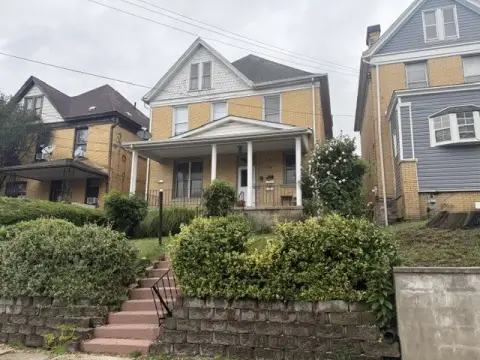 All-Brick Duplex with New Porches
