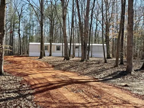 Spacious Acreage with Mobile Home