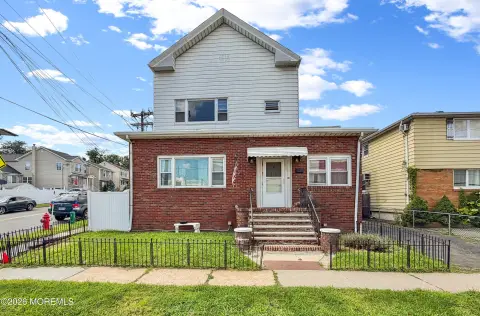 Duplex with Walk-Up Attic