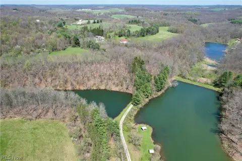 Versatile 113-Acre Property with Ponds