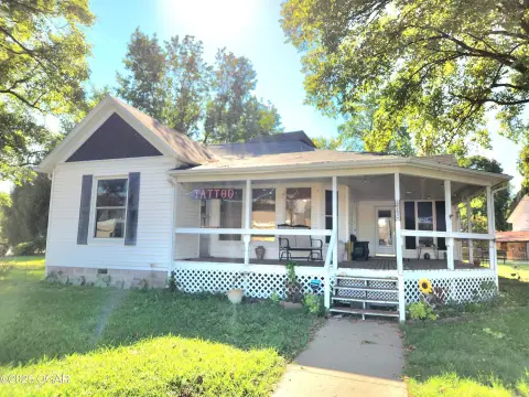 Corner Storefront with Carport