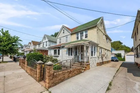 Brick Duplex with Detached Garage