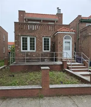 Brick Duplex With Separate Entrances