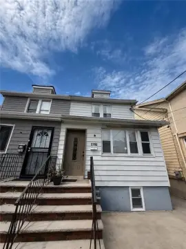 Two-Family Duplex With Driveway