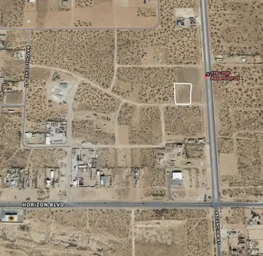 Graveled and Fenced Commercial Land