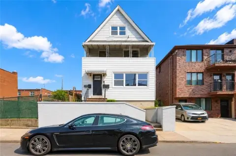 Updated Triplex With Finished Basement