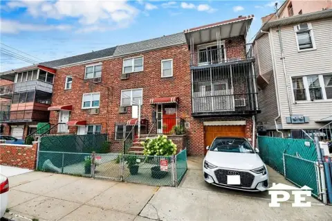 Brick Duplex With Attached Garage