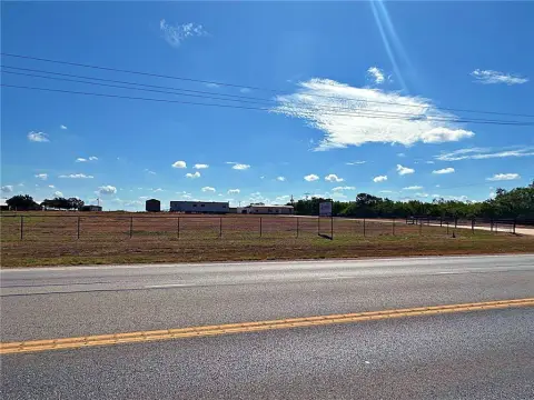 Fenced Commercial Land With Highway Access