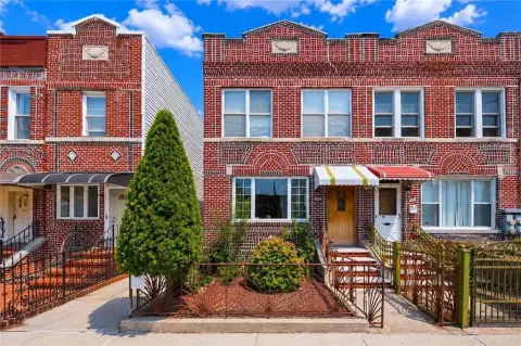 Detached Brick Triplex with Garage