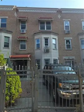 Brick Triplex With Private Parking