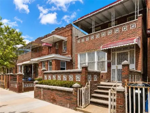 Brick Duplex With Attached Garage