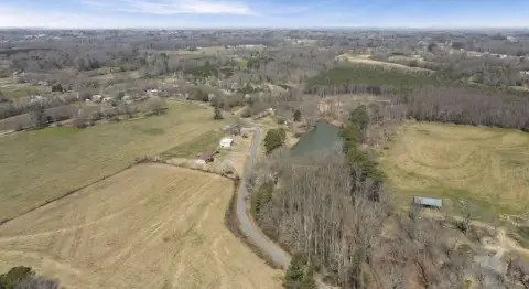Land with Pond and Building