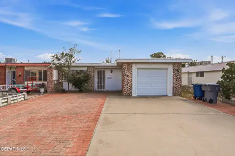 Brick Duplex with Rear Sunroom