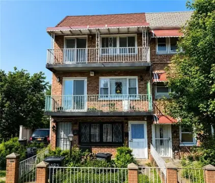 Brick Corner Duplex with Garage