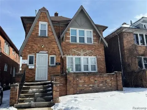 Brick Triplex with Renovated Unit