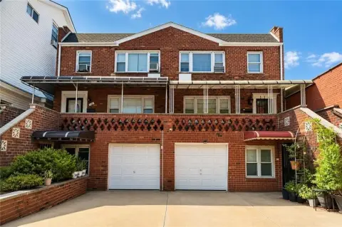 Brick Duplex with Attached Garage
