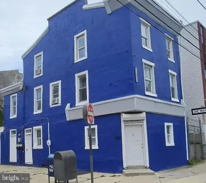 Triplex with Adjacent Vacant Lot