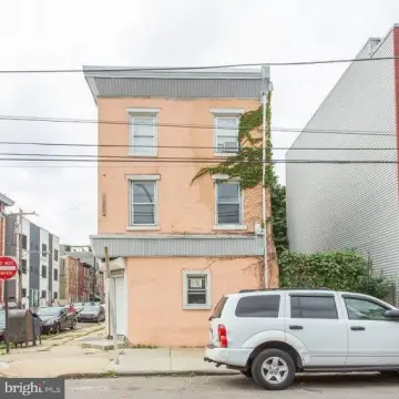 Triplex with Development Potential
