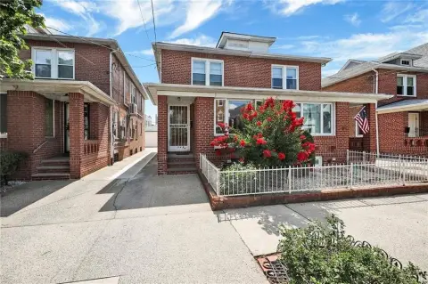 Brick Duplex with Detached Garage